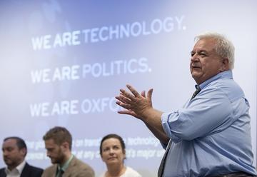 Photo of Marc Ventresca introducing the second panel